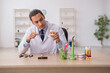 © Elnur - Young male doctor stomatologist working in the clinic