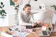 © Pixel-Shot - Young male designer working in office