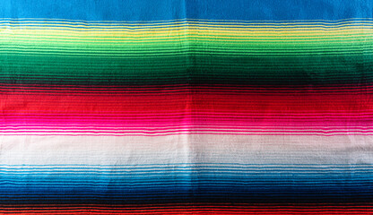 Wall Mural - Cinco de mayo background decorated image made from mexican blanket stripes or poncho serape background.