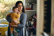© Jacob Lund - Caring mom with baby at home