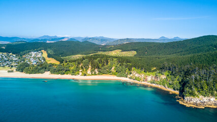 Wall Mural - Little village on a shore of a beautiful harbour. Coromandel, New Zealand.