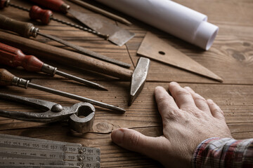 Wall Mural - Man working on a carpentry project