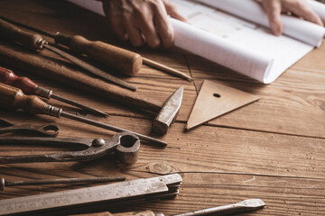 Wall Mural - Man working on a carpentry project