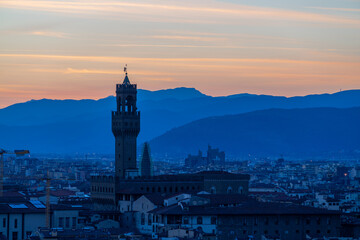 Florence or Firenze sunset aerial cityscape. Panorama view from Michelangelo park square. Ponte Vecchio bridge, Palazzo Vecchio and Duomo Cathedral. Tuscany, Italy