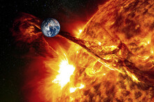 Planet Earth Against The Backdrop Of A Giant Sun, The Concept Of Solar Activity, Geomagnetic Storm. The Elements Of This Image Furnished By NASA.