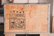Safety fragile icon on wood box with space