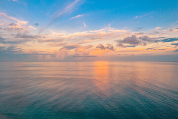 Canvas Print - Relaxing seascape with wide horizon of the sky and the sea. Sunset over the sea, tranquil nature view, aerial ocean panorama. Colorful clouds, sunrise sunset dream natural environment, Earth concept