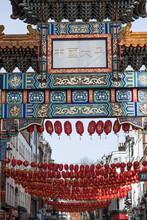 London, UK - February 23, 2021: China Town Entrance Gate With Red Lanterns Decoration.  China Town View During  Covid-19 Lockdown. No People, Empty Streets Of London
