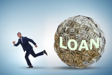 Wall Mural - Businessman running away in debt and loan concept