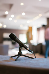 Wall Mural - microphone on table at business conference