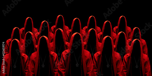 People dressed in a red robes looking like a cult members on a dark ...