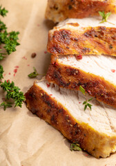 Wall Mural - Grilled pork meat sliced on the kitchen table. Selective focus. Shallow depth of field.