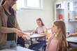 © liderina - Time for new lesson.  Teenage students with teacher on biology class.