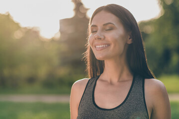 Poster - Photo of charming positive young girl closed eyes beaming smile have good mood morning park outdoors