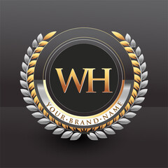 Initial logo letter WH with golden and silver color with laurel and wreath, vector logo for business and company identity.