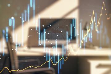 Multi exposure of abstract financial graph and modern desktop with pc on background, financial and trading concept