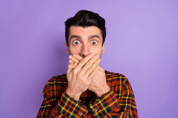 Poster - Photo of crazy guy crossed palms cover mouth look camera wear bow tie plaid shirt isolated purple background