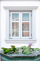 Front View of Window Vintage Styles With Exterior Decoration, Double Transparent Glass Windows and Architecture Facade Design. Residential Home Window With Reflection