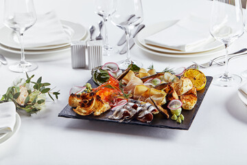 seafood platter. Assorted delicious seafood with vegetables. White background