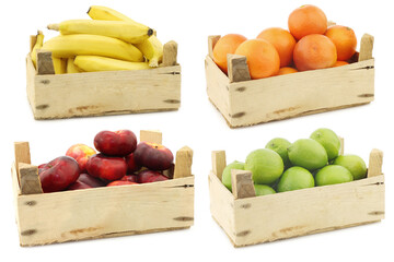 Wall Mural - Fresh bananas, blood oranges, wild flat nectarine and lime fruit in a wooden crate on a white background