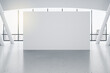 © Who is Danny - Blank white billboard on concrete floor in sunny hall room with huge window and white columns. 3D rendering, mock up