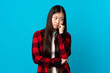 © luismolinero - Young Chinese girl over isolated blue background with tired and bored expression
