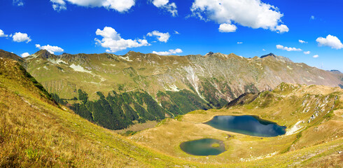 Wall Mural - landscape panorama of top mountains and lake