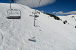 Chair lift at sunny winter day at Vail ski resort, Colorado