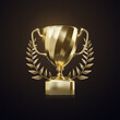 Golden champion cup with laurel wreath isolated on black background