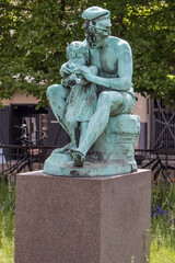 Wall Mural - A Neapolitan Fisherman Teaches His Son to Play the Flute on Lille Strandstraede Store Strandstræde Statue copenhagen Region Sjælland (Region Zealand) Denmark