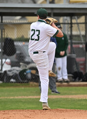 Wall Mural - Action photo of high school baseball players making amazing plays during a baseball game