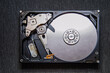© Алексей Ковалев - Disassembled hard drive from the computer, hdd with mirror effect. Opened hard drive from the computer hdd with mirror effects. Part of computer pc, laptop