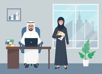 Arab business man and woman working in office.