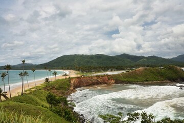 Wall Mural - El Nido Palawan in the Philippines, hidden beautiful beache at windy cloudy day, waves ocean, uneso nature resort