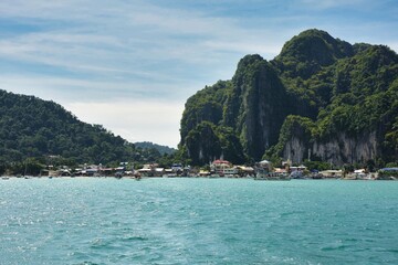 Wall Mural - El Nido Palawan harbor bamboo boats with blue sky, Island hopping, dive spot, beache ,cliff, uneso nature, philippines