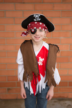 Boy Dressed As A Pirate