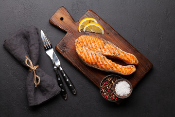 Sticker - Grilled salmon steak. Fish steak with herbs and spices