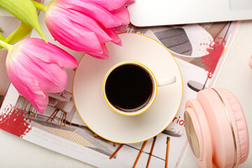 Sticker - Cup of coffee with flowers, magazine and headphones on white background