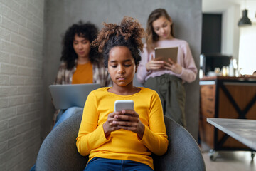 Wall Mural - Multiethnic diverse teens studying at home for online school