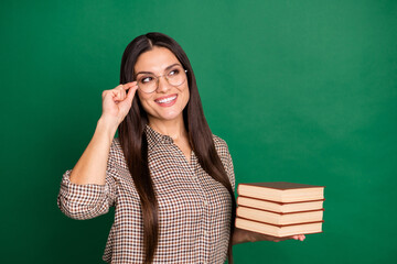 Sticker - Photo of charming mature lady hold pile book look empty space wear specs plaid shirt isolated green color background