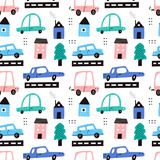 Fototapeta Londyn - Cute childish cars in city vector seamless pattern with texture. Colorful cartoon auto transports, houses, trees isolated on white background. Kids automobile wallpaper