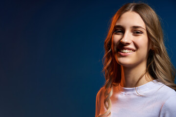 Closeup portrait of young Caucasian girl looking at camera