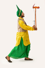 Wall Mural - A Bhangra Dancer holding the string of Kato.	