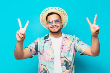 young hispanic traveler man celebrating successful a victory