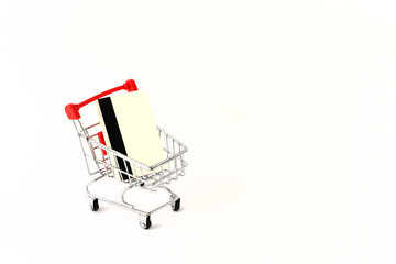 Shopping cart carrying a credit card.