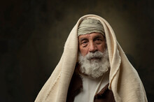 Portrait Of Old Bearded Man With Ancient Attire