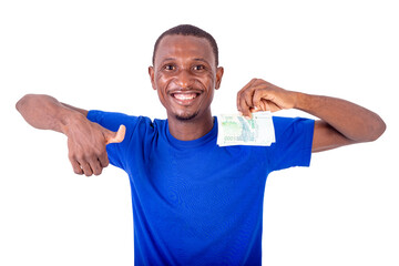 close-up of a young man with banknotes, happy.