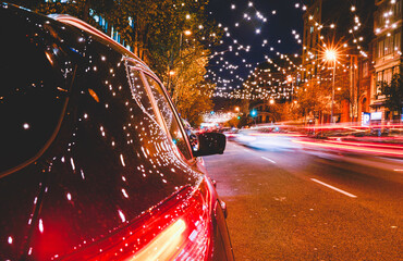 Bright traffic light with car in city