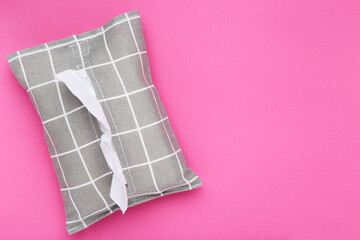 Napkin box on pink background