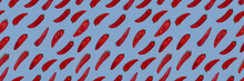 Abstract Seamless Pattern Of Fresh Red Long Sweet Pointed Peppers On Color Background.